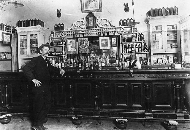 A bar displaying different kinds of beer and hard drinks