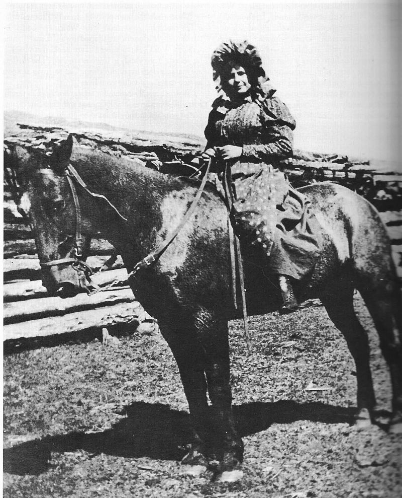Wild West Beauty Cattle Kate riding a horse