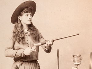 Annie Oakley holding riffle